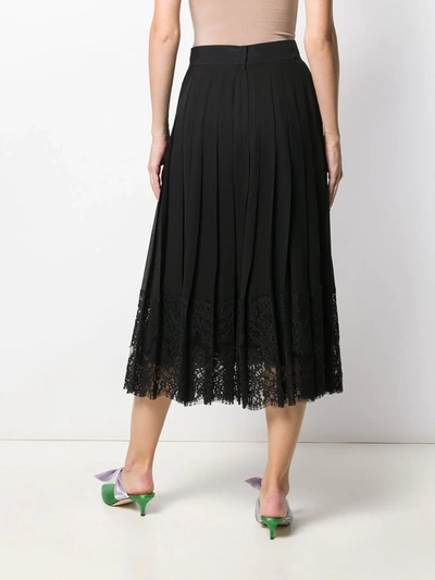 Shop Dolce & Gabbana Flared Lace-hem Skirt In Black
