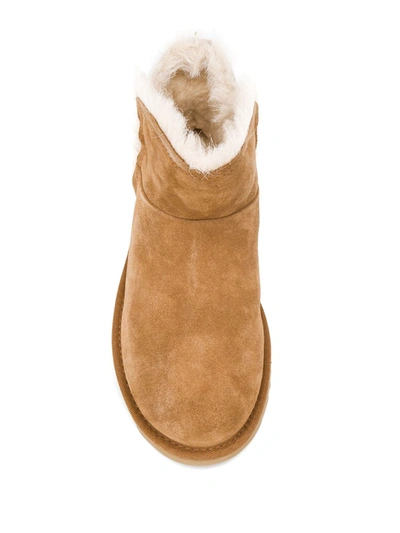 Shop Ugg Mini Fluff Slip-on Boots In Brown