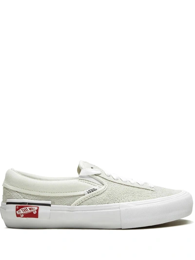 Shop Vans Cap Lx Slip-on Sneakers In White