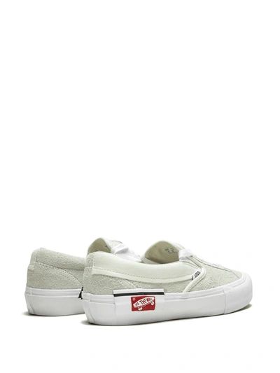 Shop Vans Cap Lx Slip-on Sneakers In White