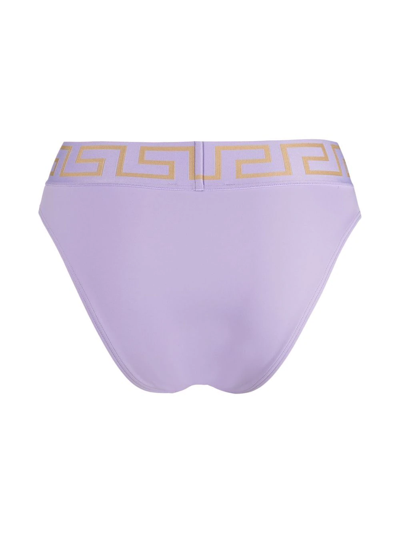 Shop Versace Greca Key Bikini Bottoms In 紫色