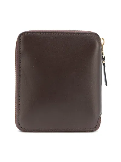 Comme Des Garçons Play Zip Wallet In Brown
