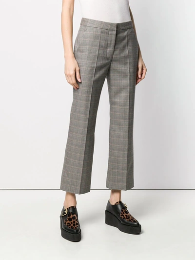 Shop Stella Mccartney Checked Flare Trousers In Black