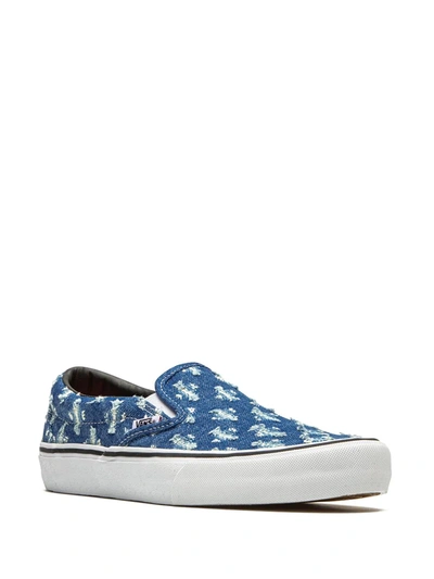 Shop Vans X Supreme Slip-on Pro "blue Hole Punch Denim" Sneakers