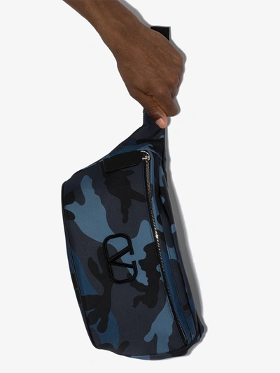 Shop Valentino Camouflage-print Belt Bag In Blue