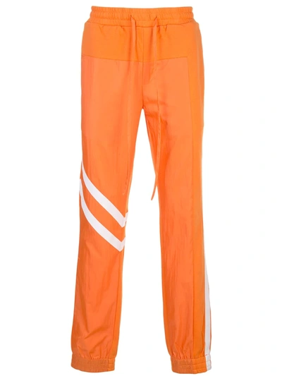 Shop God's Masterful Children Geometric Panelled Track Pants In Orange