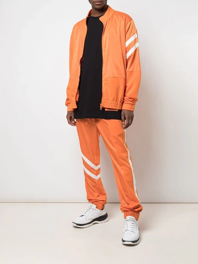 God's Masterful Children Geometric Panelled Track Pants In Orange