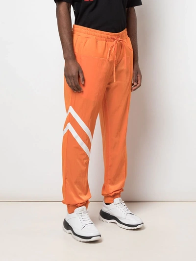 God's Masterful Children Geometric Panelled Track Pants In Orange