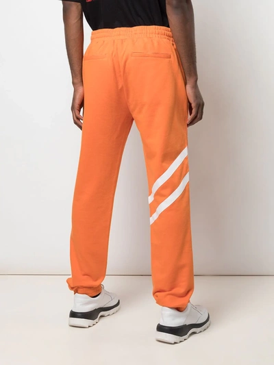 Shop God's Masterful Children Geometric Panelled Track Pants In Orange