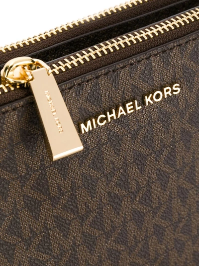 Shop Michael Michael Kors Monogram Print Crossbody Bag In Brown