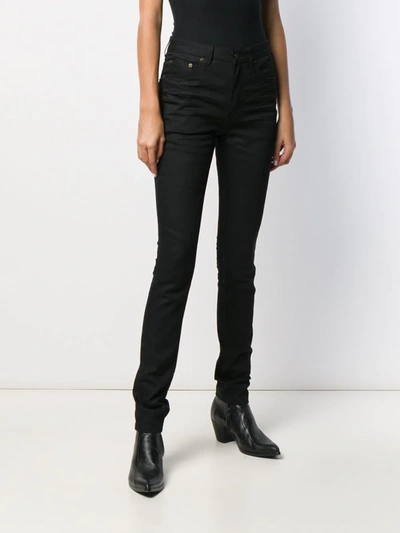 Shop Saint Laurent Mid-rise Skinny Jeans In Black