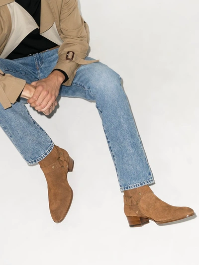 Shop Saint Laurent Wyatt Suede Boots In Brown