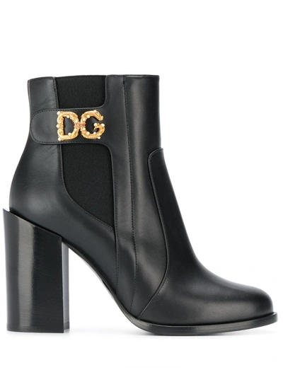 Shop Dolce & Gabbana Embellished Logo Boots In Black