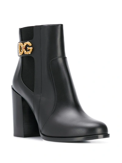 Shop Dolce & Gabbana Embellished Logo Boots In Black