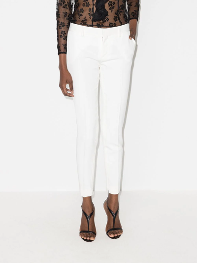 Saint Laurent Pleated Front Slim-fit Trousers In Nude