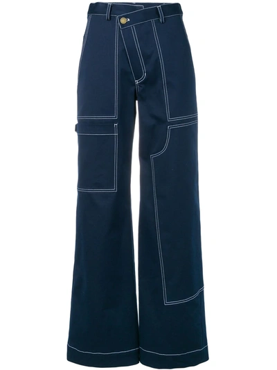 Shop Monse Wide Leg Bootcut Trousers In Blue