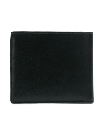 Shop Saint Laurent East/west Monogram Wallet In Black