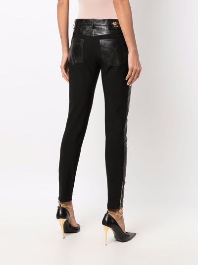 Shop Versace Bi-material Skinny-fit Trousers In Black