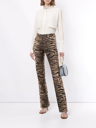 Shop Giambattista Valli Tiger Print Flare Trousers In Brown