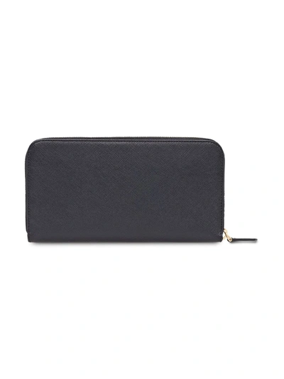 Prada Zipped Continental Wallet In Black