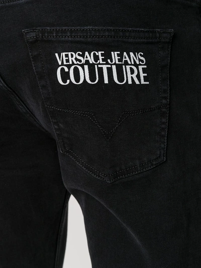 Shop Versace Jeans Couture Logo Print Straight Jeans In Black