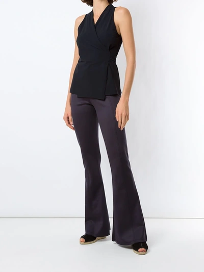 Shop Amir Slama Sleeveless Wrap Blouse In Black