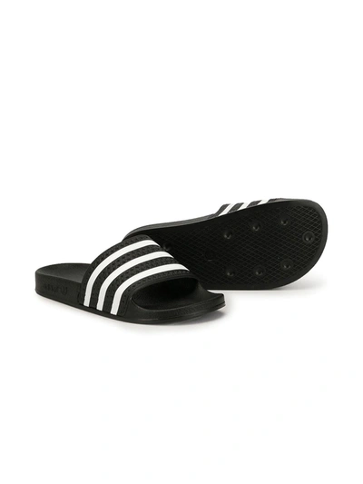 Shop Adidas Originals Teen Adilette Striped Slides In Black