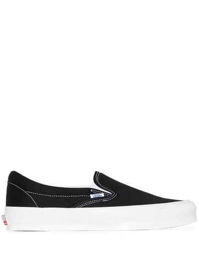 Shop Vans Ua Og Classic Slip-on Lx Sneakers In Black