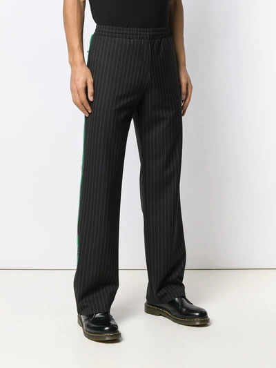 Shop Off-white Pinstriped Eagle Stripe Trousers In Black