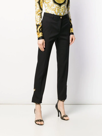 Shop Versace Safety-pin Tailored Trousers In Black