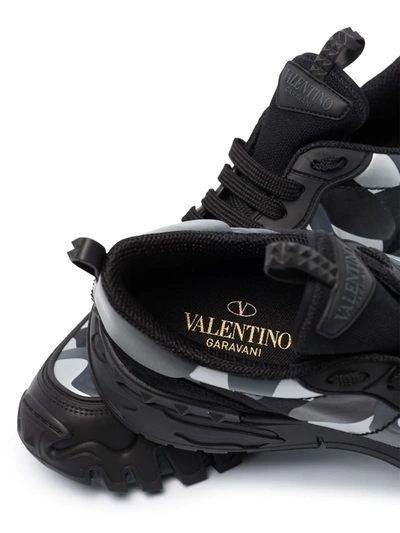 Shop Valentino Rockrunner Leather Sneakers In Black