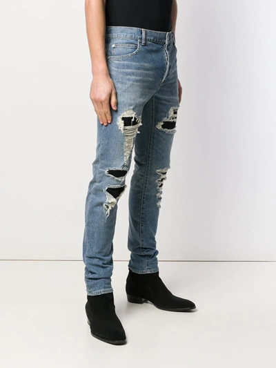 Shop Balmain Distressed Jeans In Blue