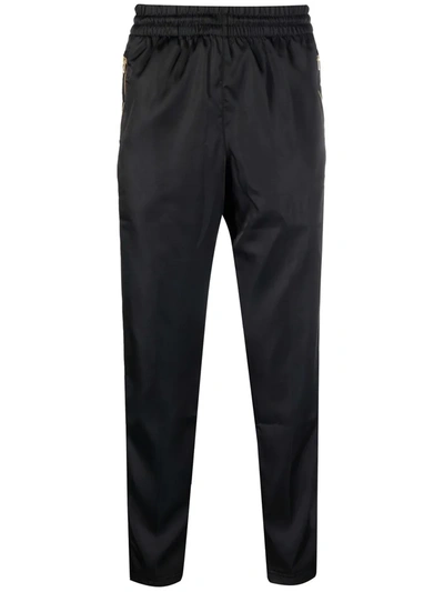 Shop Adidas Originals Side-stripe Slip-on Track Trousers In Black