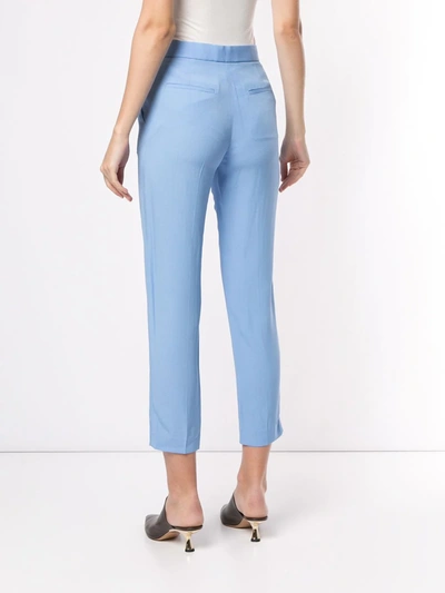 Shop Rosetta Getty Cropped Tapered Trousers In Blue