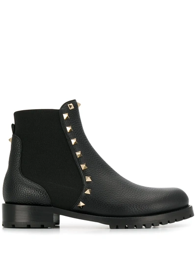 Shop Valentino Rockstud Ankle Boots In Black