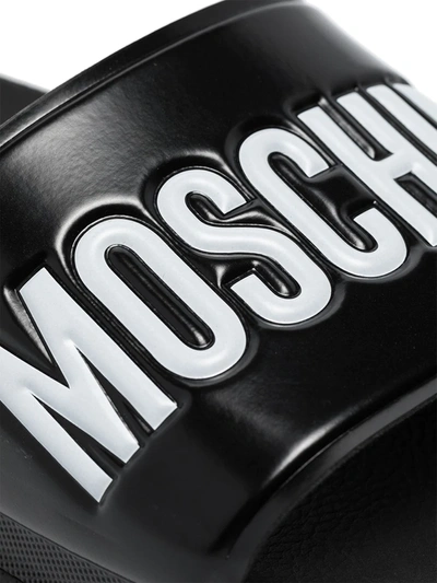 Shop Moschino Logo Print Pool Slides In Black