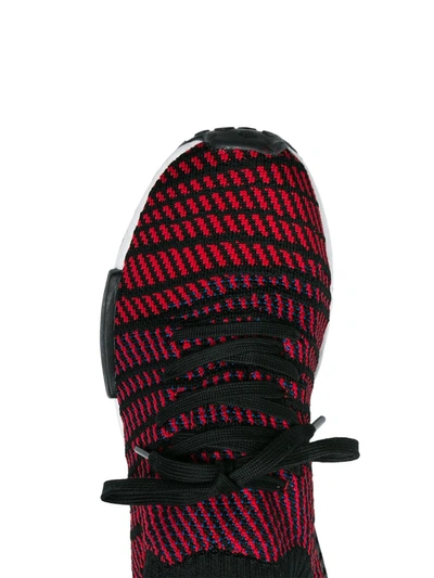 Black and red NMD R1 STLT sneakers