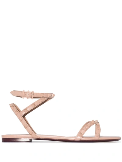 Shop Valentino Rockstud Flair Sandals In Neutrals