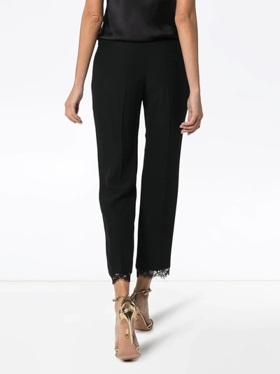 Shop Alexander Mcqueen Cropped Lace-trimmed Trousers In Black