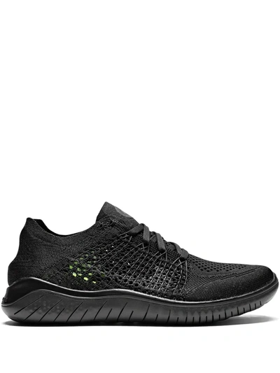 Shop Nike Free Rn Flyknit Sneakers In Black