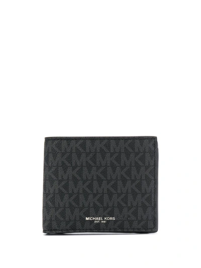 Shop Michael Michael Kors Logo-print Foldover Wallet In Black