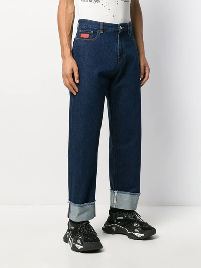 Shop Gcds Wide-fit Logo Patch Trousers In Blue