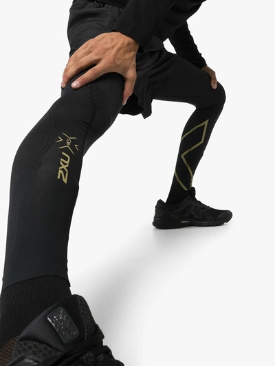 Shop 2xu Reflective Running Leggings In Black