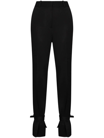 Shop Jw Anderson Tie Hem Slim Fit Trousers In Black