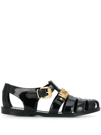 Shop Moschino Lettering Logo Jelly Sandals In Black