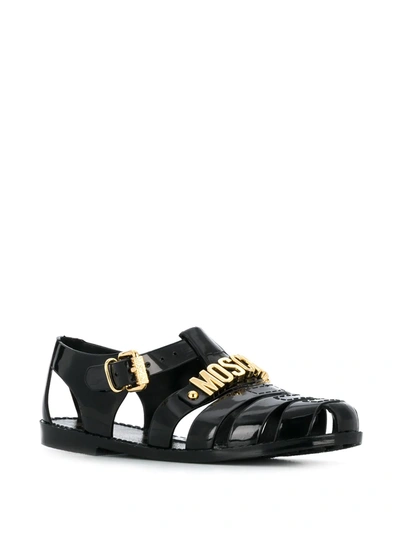 Shop Moschino Lettering Logo Jelly Sandals In Black