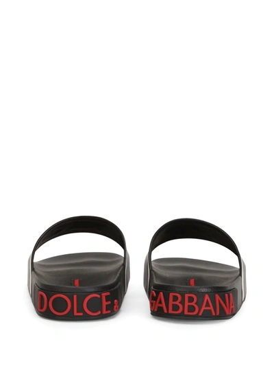 Shop Dolce & Gabbana Raised Logo Slides In Black