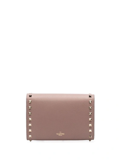 Rockstud leather clutch bag Valentino Garavani Purple in Leather - 16841770