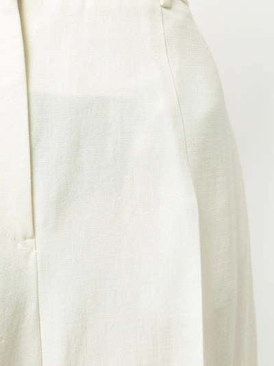 Shop Jil Sander Creased Tapered Trousers In White