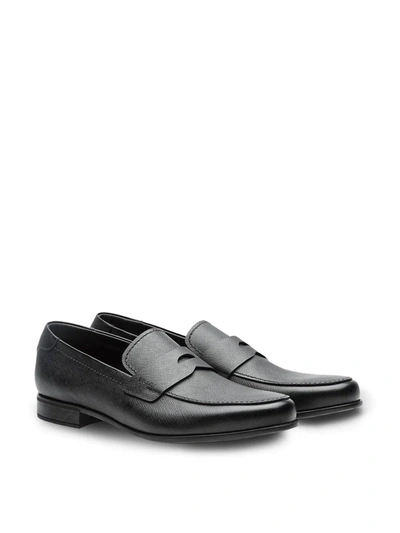 Shop Prada Saffiano Classic Loafers In Black